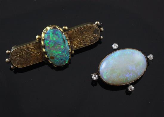 An Edwardian gold, white opal and diamond set pendant brooch, 2in.